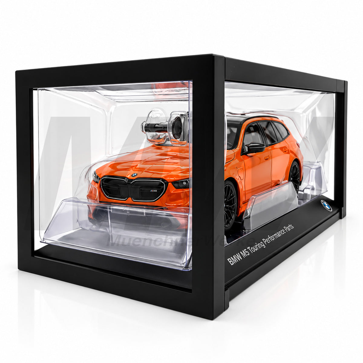 MuenchnerWerke genuine BMW M5 G99 Touring miniature in orange, official BMW collector model featuring the M Performance Parts design in 1:18 scale.