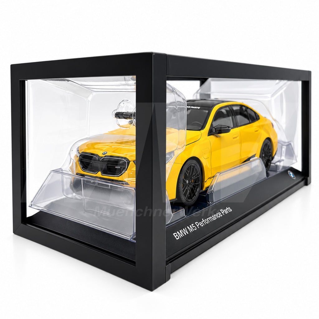 MuenchnerWerke Original BMW M5 G90 sedan with M Performance Parts in yellow, 1:18 scale collectible model representing the BMW M high-performance sports sedan.
