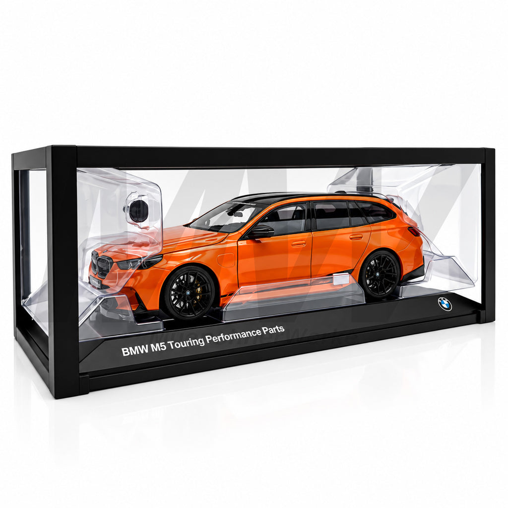 MuenchnerWerke Original BMW M5 Touring G99 Performance Parts model car in orange, genuine BMW 1:18 scale collectible miniature, part number 80435B6CBE8.