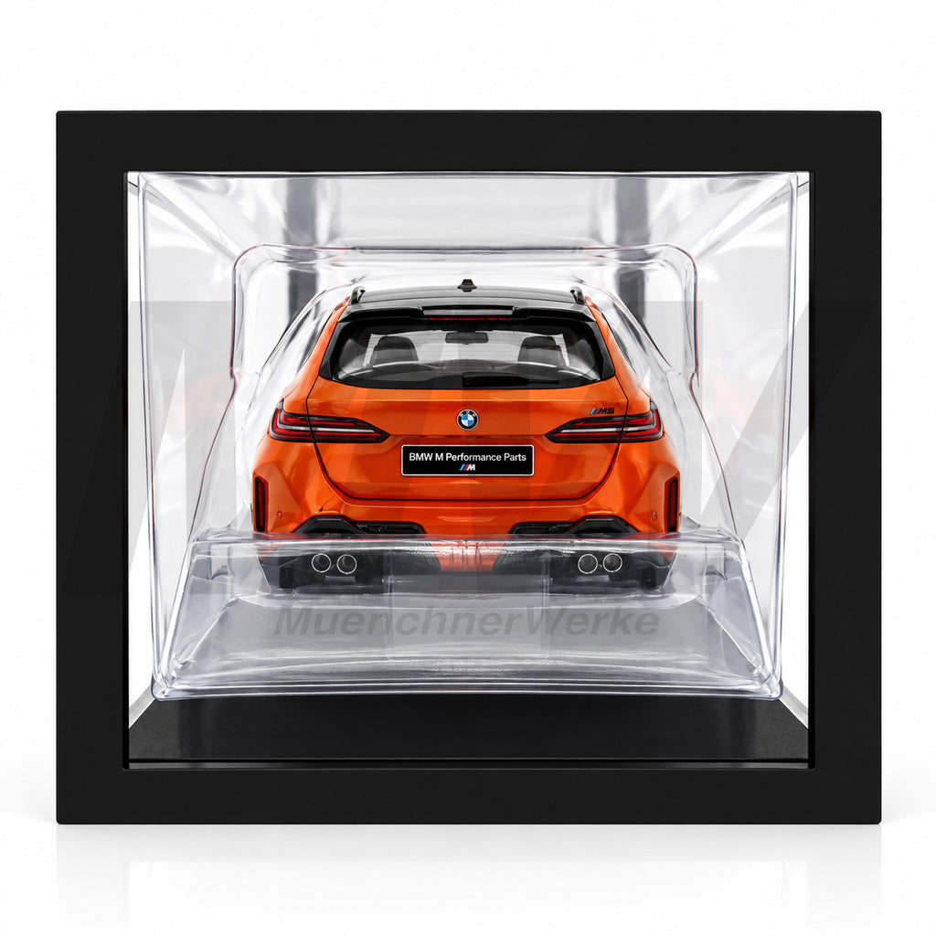 MuenchnerWerke Original BMW M5 Touring with M Performance Parts in orange, 1:18 scale model of the G99 performance wagon for BMW M collectors and enthusiasts.