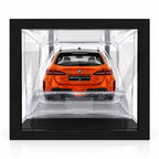 MuenchnerWerke Original BMW M5 Touring with M Performance Parts in orange, 1:18 scale model of the G99 performance wagon for BMW M collectors and enthusiasts.