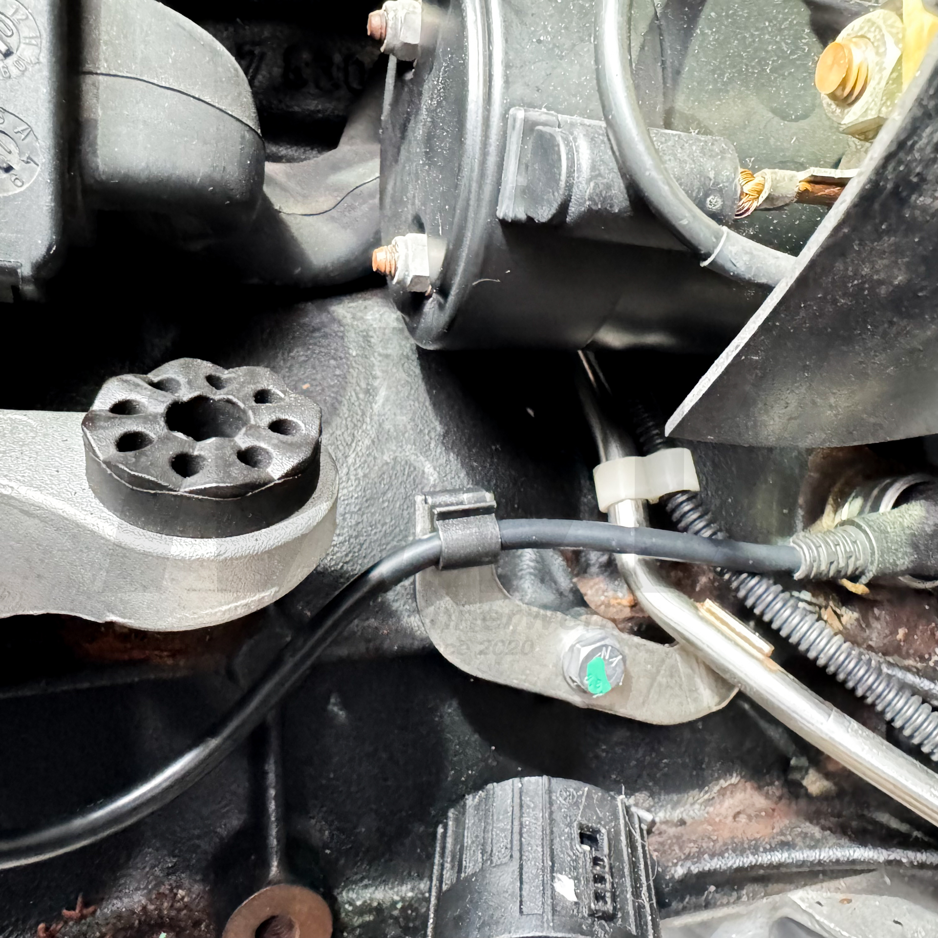 OEM BMW E46 M3 plastic holder for crankshaft sensor on fuel line